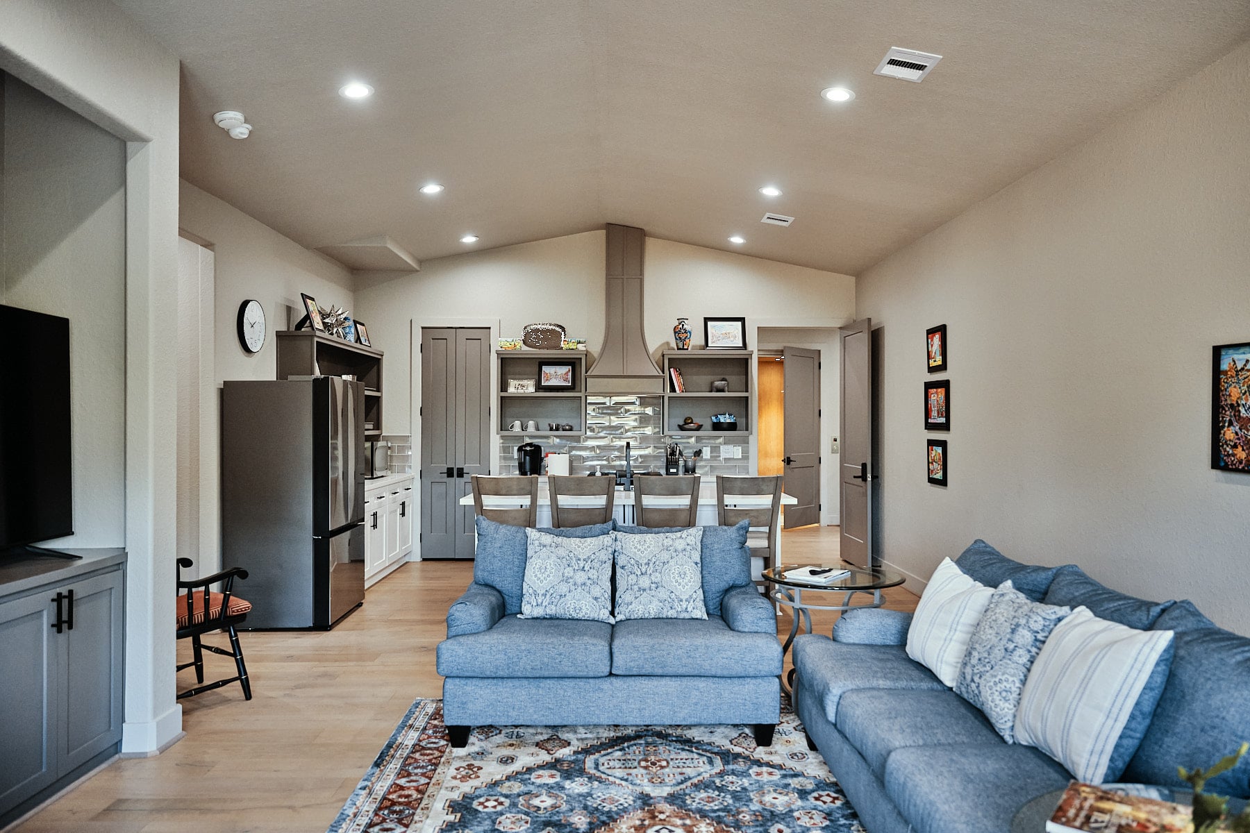 Spacious living area and commercial kitchen at Whispering Trees Farm, a luxury retreat near Bellville,
